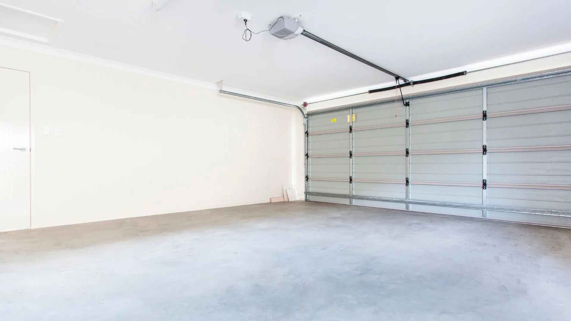 Garage door opener and track hardware
